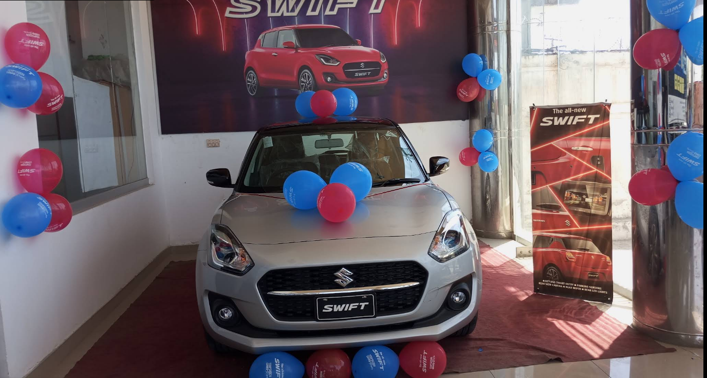 Suzuki Swift with balloons at showroom